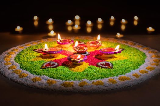 Diwali is a festival of lights celebrations by Hindus , Jains, Sikhs and some Buddhists