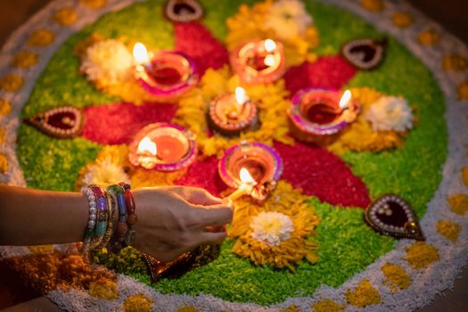 Diwali is a festival of lights celebrations by Hindus , Jains, Sikhs and some Buddhists