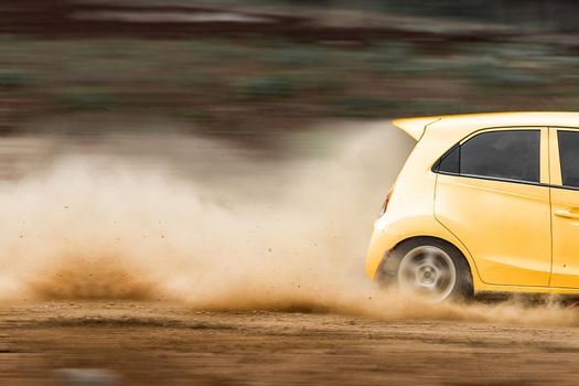 Rally car in dirt track