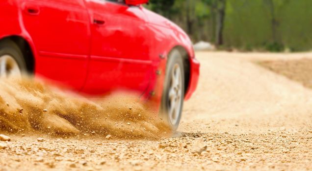 Rally car in dirt track.