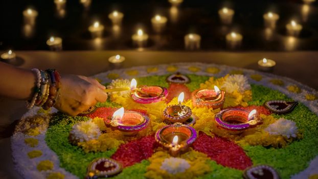 Diwali is a festival of lights celebrations by Hindus , Jains, Sikhs and some Buddhists