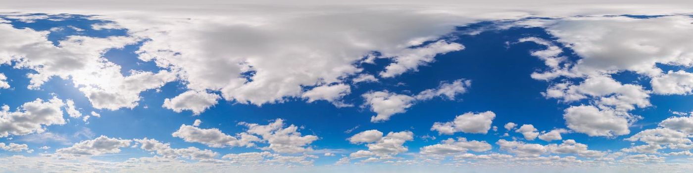Seamless hdri panorama 360 degrees angle view blue sky with beautiful cumulus clouds with zenith for use in 3d graphics or game development as sky dome or edit drone shot