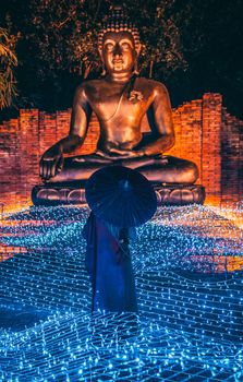 Buddhist tradition light festival in Ratchaburi, Nasatta, Thailand. High quality photo