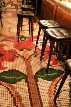 Alicante, Spain- June 26, 2022: Mosaic floor of the Manero bar in Alicante with beautiful colonial style