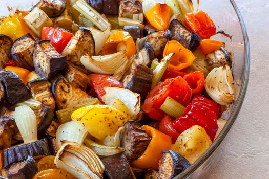 oven dish with baked vegetables, closeup photo