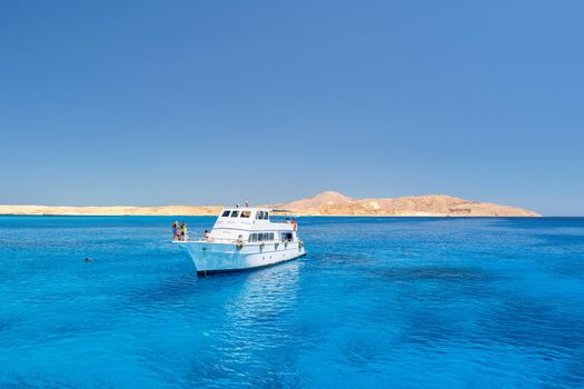 Yacht in the sea with clear water. The concept of leisure and travel.