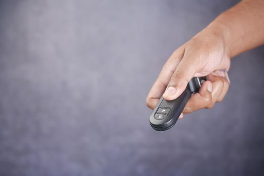 holding a car key with copy space ,