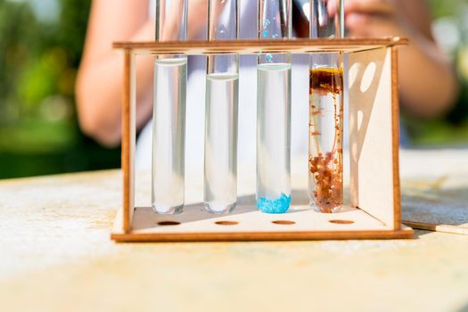 chemical reaction at chemistry laboratory - concept of child prodigy, intelligent and smart.