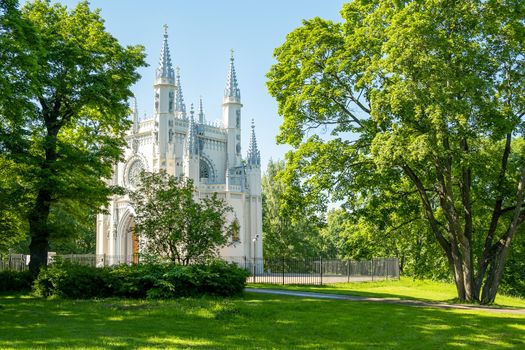 St. Petersburg, Peterhof, Russia - June 25, 2022. Beautiful building of the Gothic chapel in Alexandria park. Historical buildings, architecture. Selective focus.