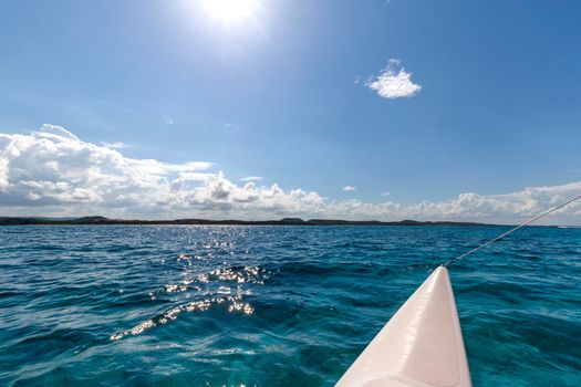 Beautiful landscape from the catamaran to Atlantic ocean and coastline, Turquoise water and blue sky with clouds. Cuba