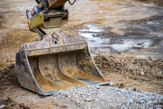 Digger bucket close-up. Construction excavator bucket.