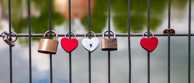 Heart-shaped padlocks. Locks of love - a symbol of everlasting friendship.