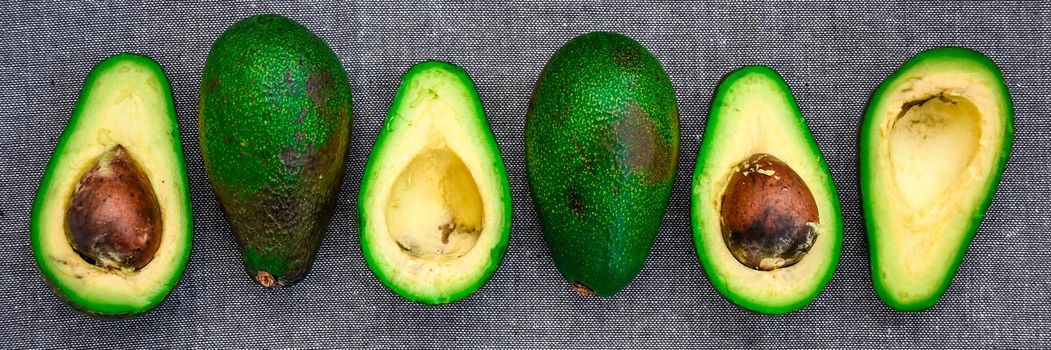 Banner for organic healthy food concept of avocados, top view, vegetarian food
