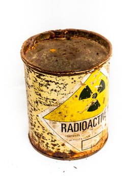 Radiation warning sign on transport index label stick on the old and rusted cylinder shape container of Radioactive material