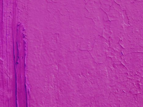 Abstract background of old purple plaster...