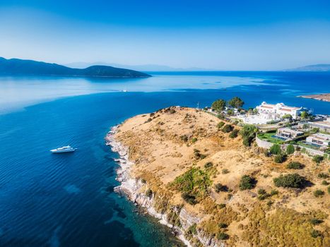 Beautiful nature landscape of greece island with luxury boat mediterranean sea, water travel, summer holliday vacation trip, mountains on background