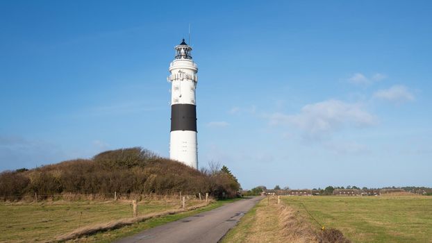 Panoramic image of Kampen lighthouse against sky, Sylt, North Frisia, Germany 