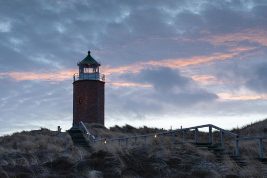 Panoramic image of Kampen lighthouse against evening sky, Sylt, North Frisia, Germany 