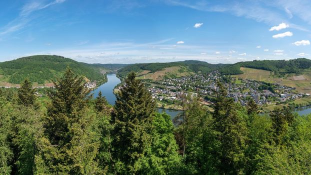 Panoramic view to the village Puenderich with Moselle river, Germany