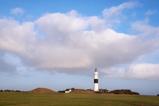 Panoramic image of Kampen lighthouse against sky, Sylt, North Frisia, Germany 