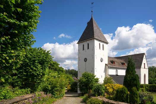 Panoramic image of old church in Muellenbach against blue sky, Marienheide, Bergisches Land, Germany 