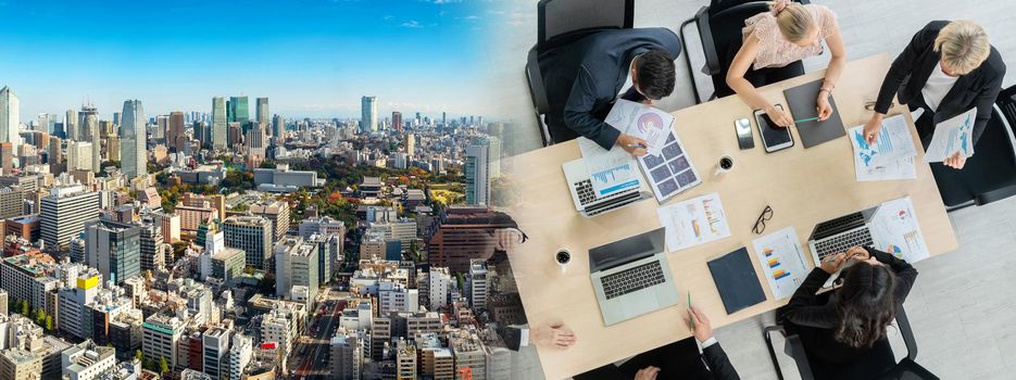 Business people group meeting shot from top widen view in office . Profession businesswomen, businessmen and office workers working in team conference with project planning document on meeting table .