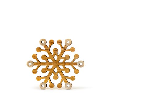 Snowflake on a white background. Wooden snowflakes cast shadow on white isolated background. Printable banner, mockup for christmas card, place for text.