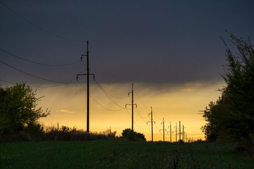 power lines at sunset, high voltage post,High voltage tower sky sunset background. download photo