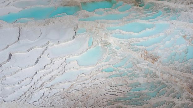 Natural travertine pools in Pamukkale. Pamukkale, Turkey. View on travertine pools. Nature