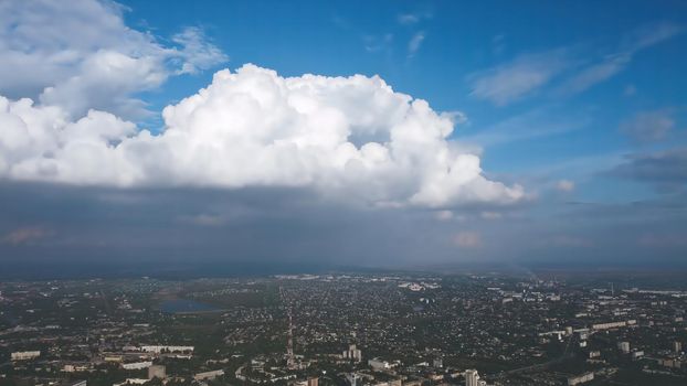 Big clouds over the City. sky with a stormy clouds just before storm - nature photography. The rain is coming soon.