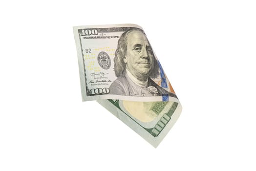 Isolate on white hundred dollar bills. American money folded in half, close-up
