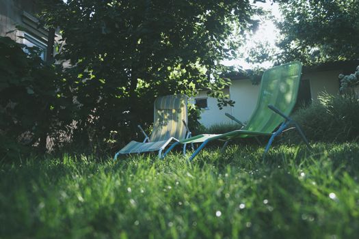 two chairs in green garden terrace. relax zone. backyard