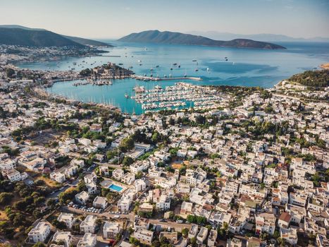 Beautiful Mediterranean seascape. Beautiful European town in greece style on summer sea coast. panorama landscape view sky, mountains, water, city houses, ships and boats amazing seascape.