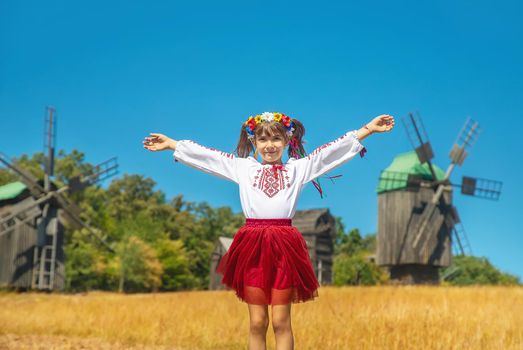 A child in a national Ukrainian costume. Selective focus.