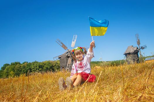 A child in a national Ukrainian costume. Selective focus.