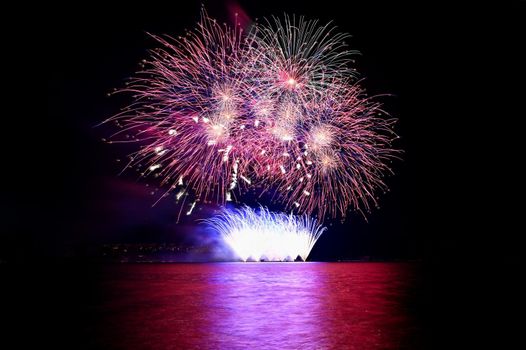 Beautiful colorful fireworks over the water. International fireworks competition Brno - Czech Republic.