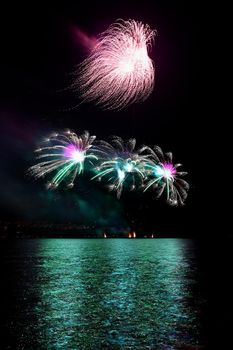 Beautiful colorful fireworks over the water. International fireworks competition Brno - Czech Republic.