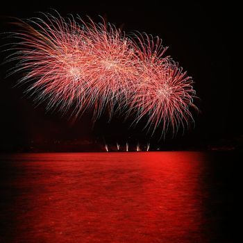 Beautiful colorful fireworks over the water. International fireworks competition Brno - Czech Republic.