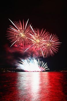 Beautiful colorful fireworks over the water. International fireworks competition Brno - Czech Republic.