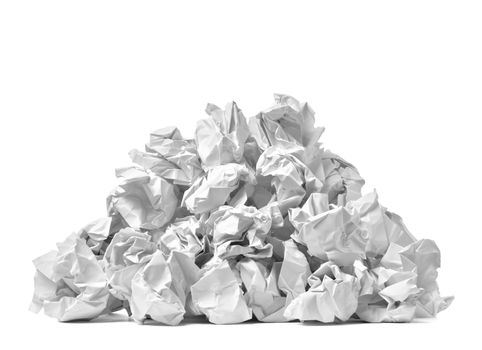 close up of a paper ball trash on white background