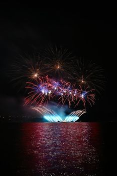 Beautiful colorful fireworks over the water. International fireworks competition Brno - Czech Republic.