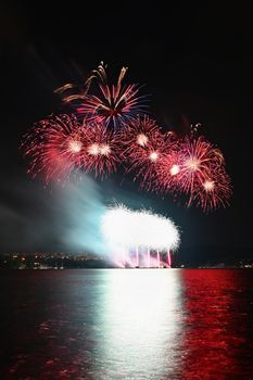 Beautiful colorful fireworks over the water. International fireworks competition Brno - Czech Republic.