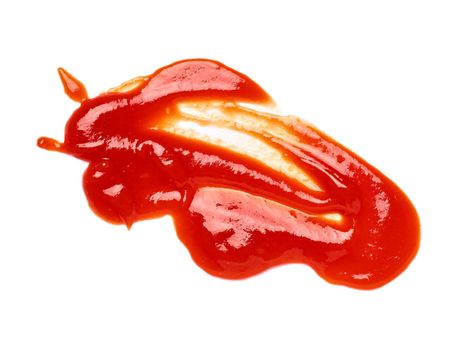 close up of a ketchup stain on white background