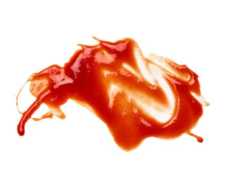 close up of a ketchup stain on white background