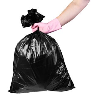 close up of a hand holding plastic bag for trash waste on white background