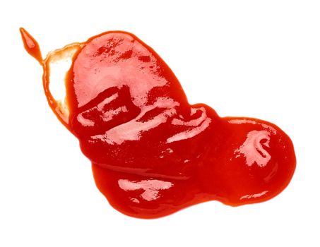 close up of a ketchup stain on white background