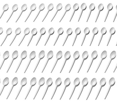 close up of a plastic cutlery spoons on white background