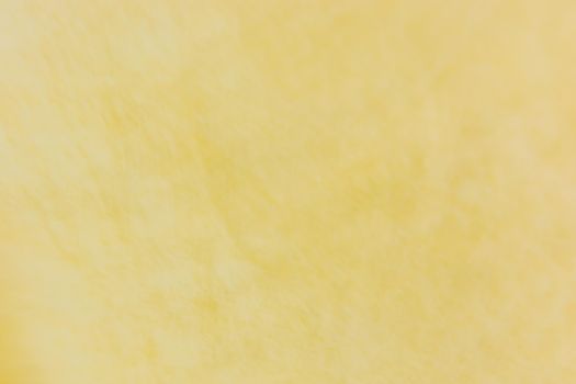 Yellow mustard banner background with stains and abrasions. Abstraction. Backdrop