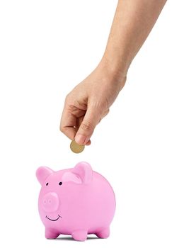 Close up of a pink piggy bank on white background