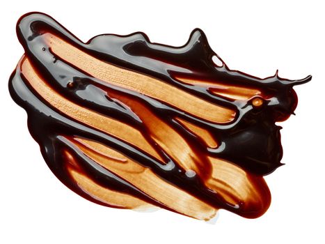 close up of a chocolate stain on white background